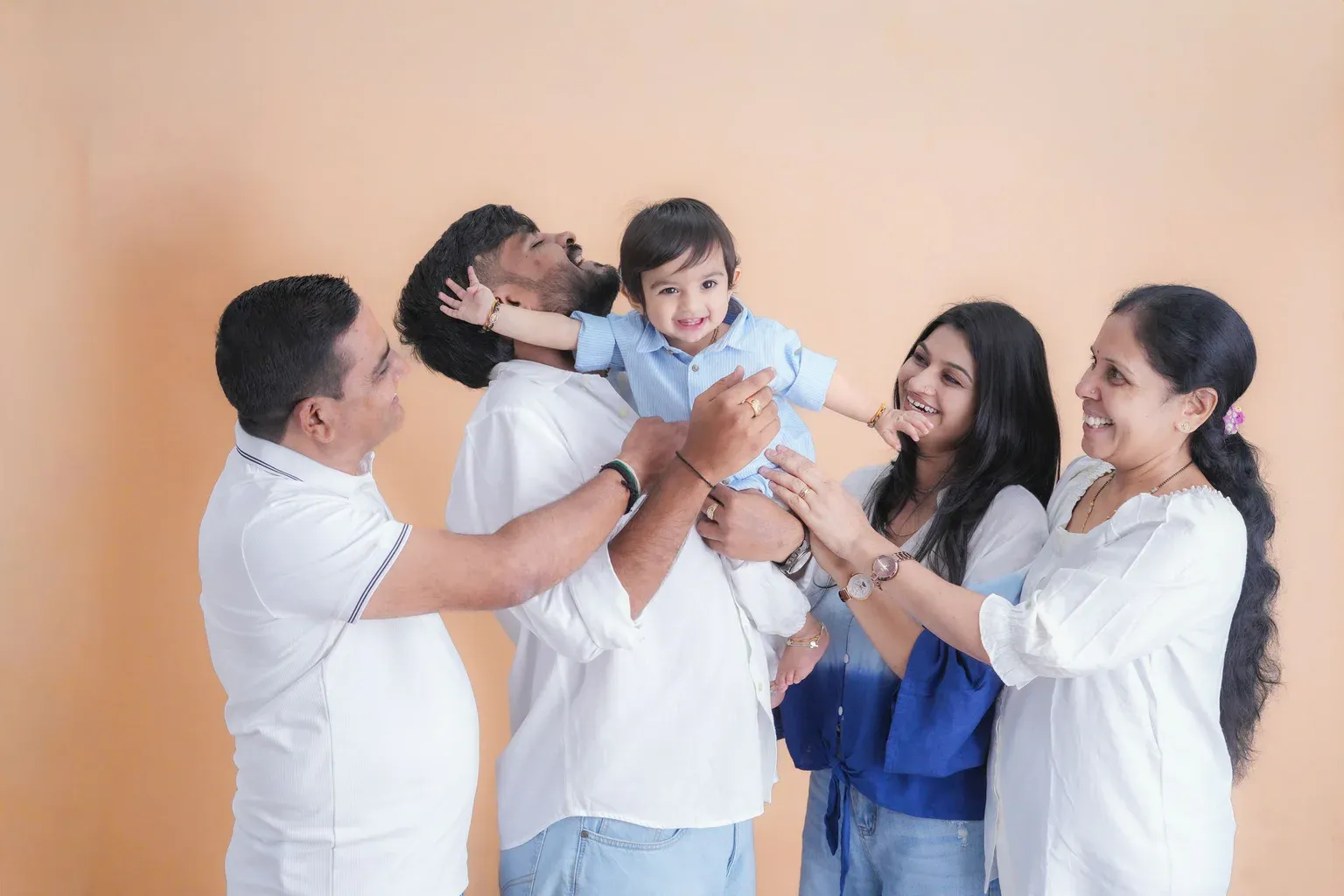 A multigenerational family sharing a joyful moment together